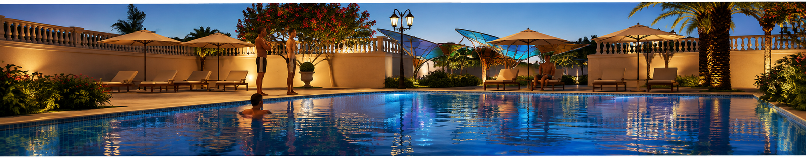 Shreeya Vista Homes Swimming Pool with 2 guys standing outside and 1 guy in the water swimming
